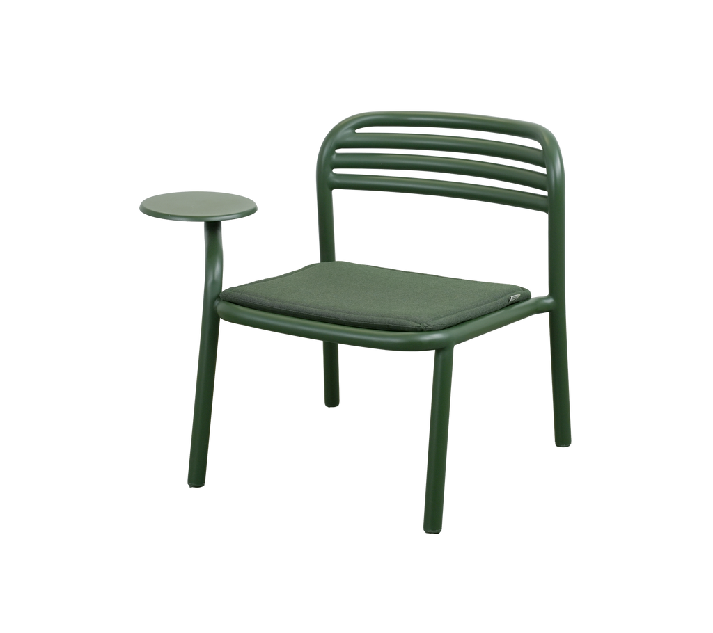 Dark green chair with a side table in a modern design.