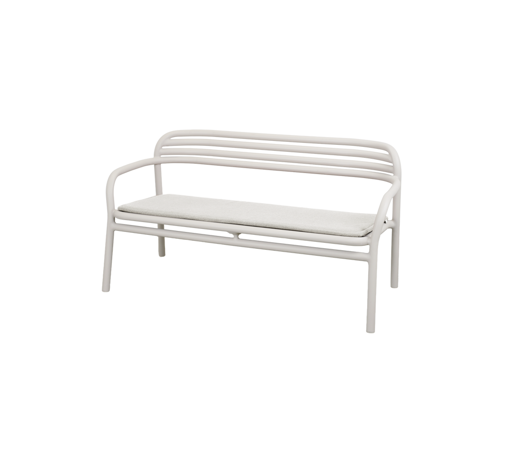 Modern sand-colored bench with a minimalist design.