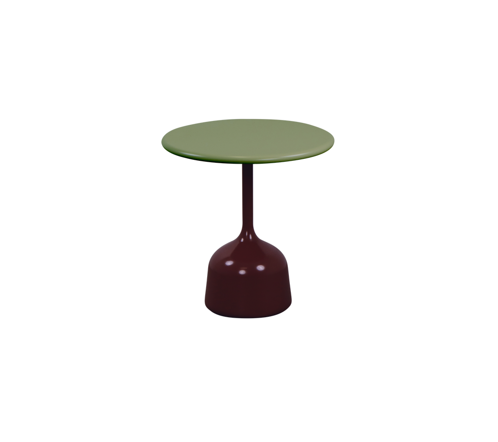 Olive green table with burgundy base in a modern lounge setting.