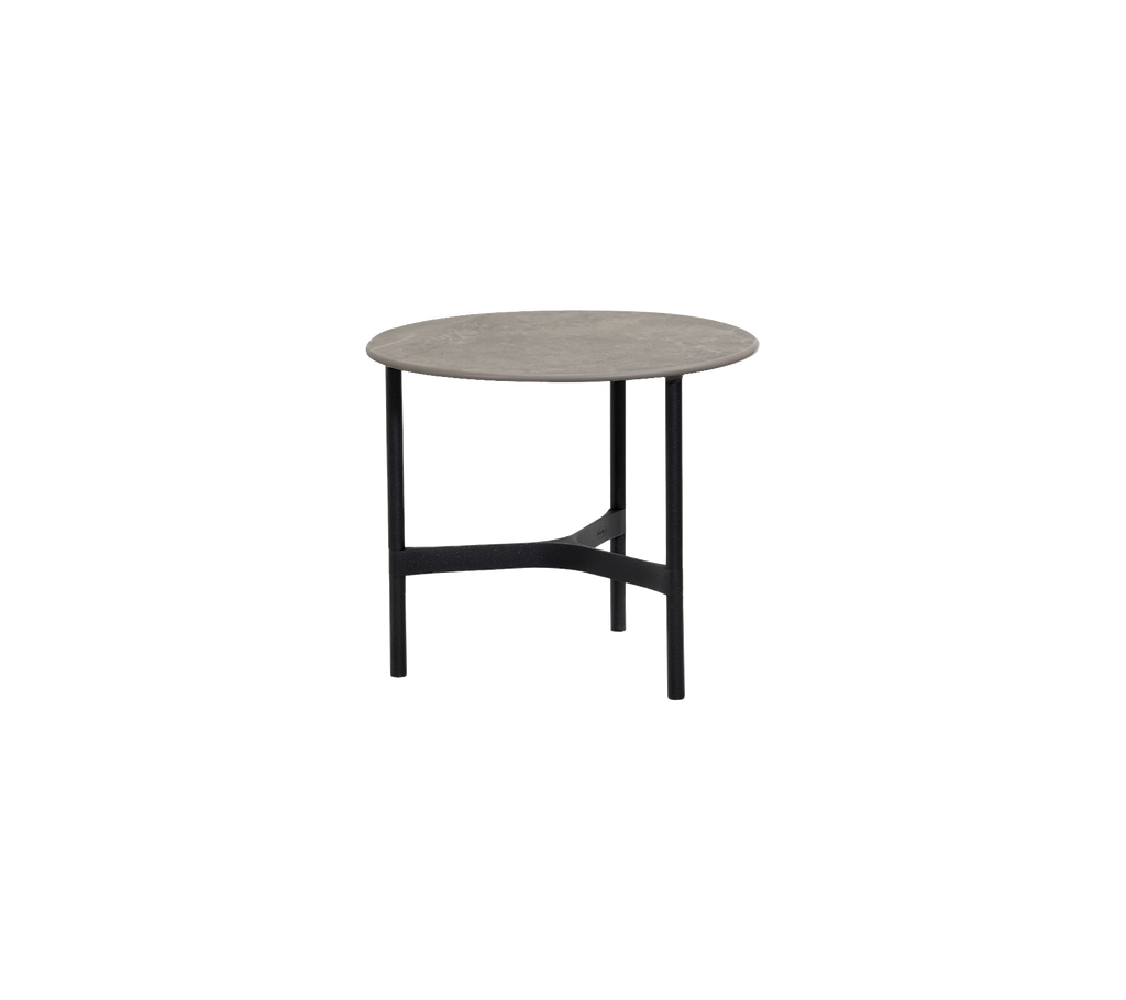 Round grey table with a black base.