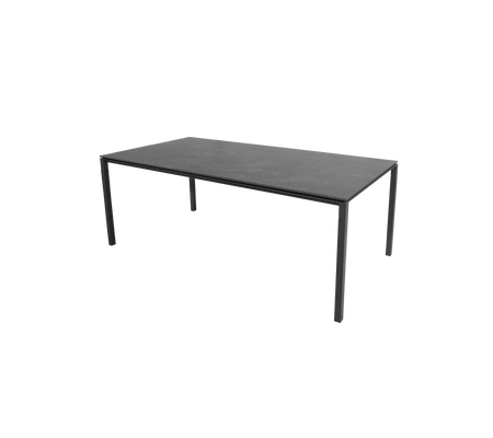 A sleek, modern table featuring a flat surface supported by slender legs, designed for versatile use in various settings.