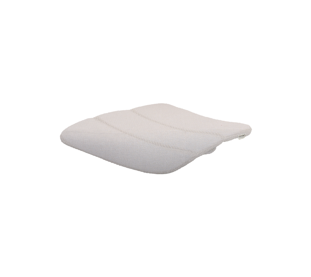 Sand-colored cushion with a smooth, curved design.