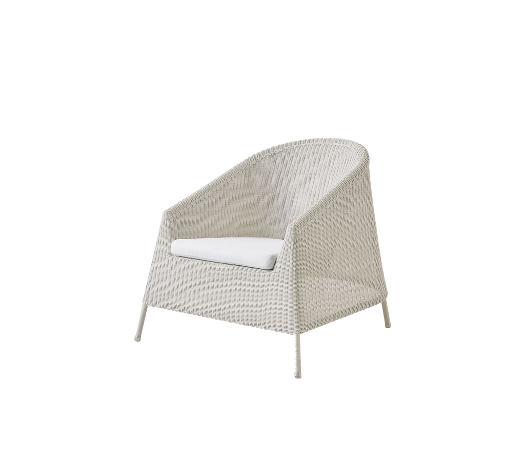 Modern white chair with a cushion, showcasing a minimalist design.