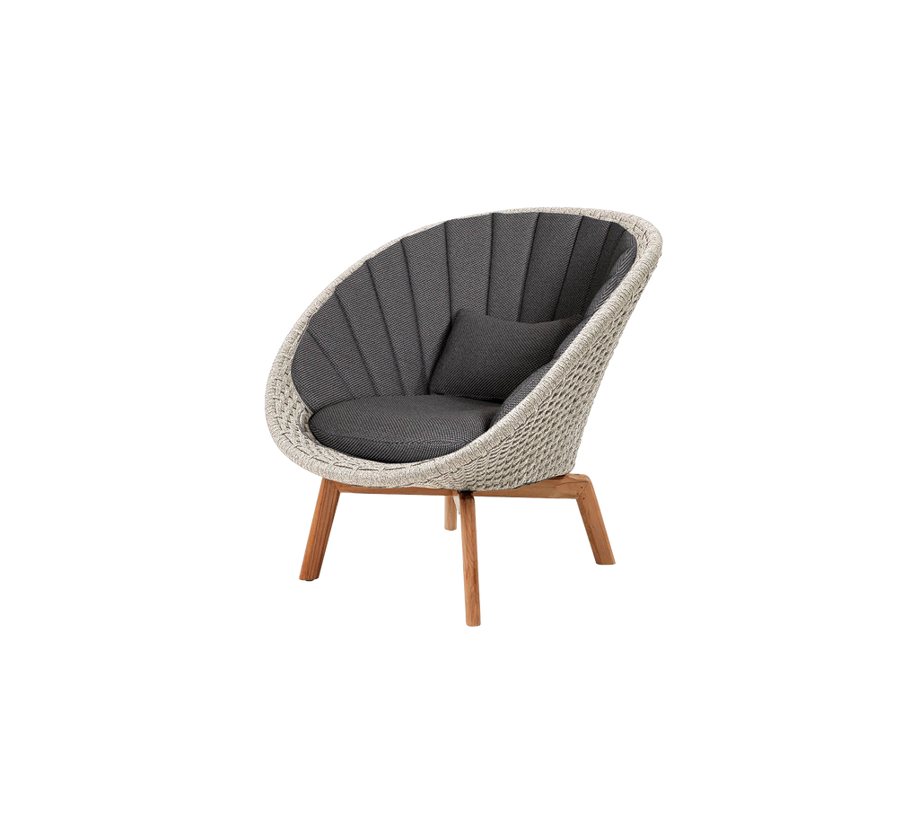 Modern grey chair with a unique shape and wooden legs.