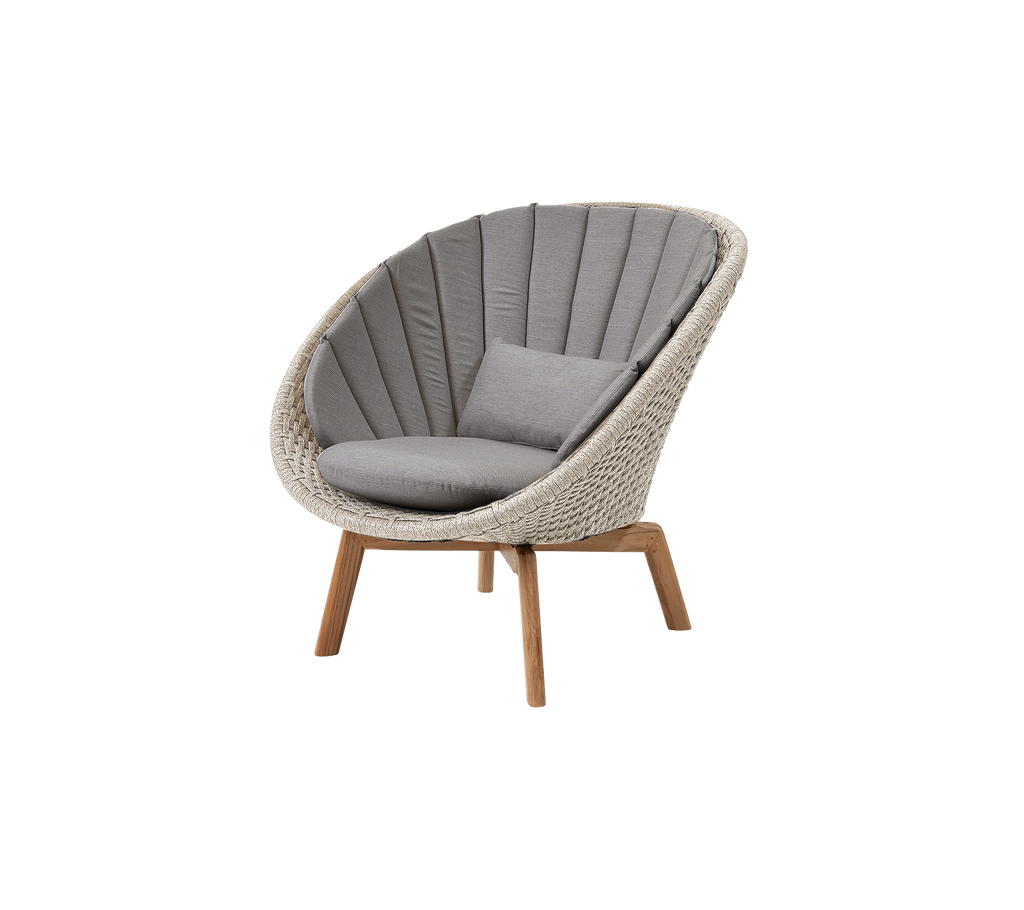 Modern grey chair with a curved design and wooden legs.