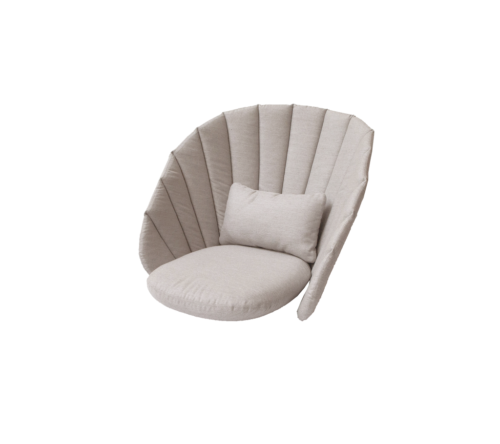 Modern sand-colored chair with a matching cushion in a contemporary design.