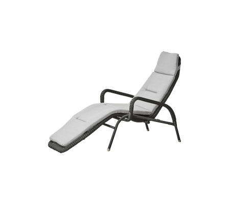 Comfortable lounge chair with a sleek design, featuring a padded seat and backrest for relaxation. Ideal for leisure time.