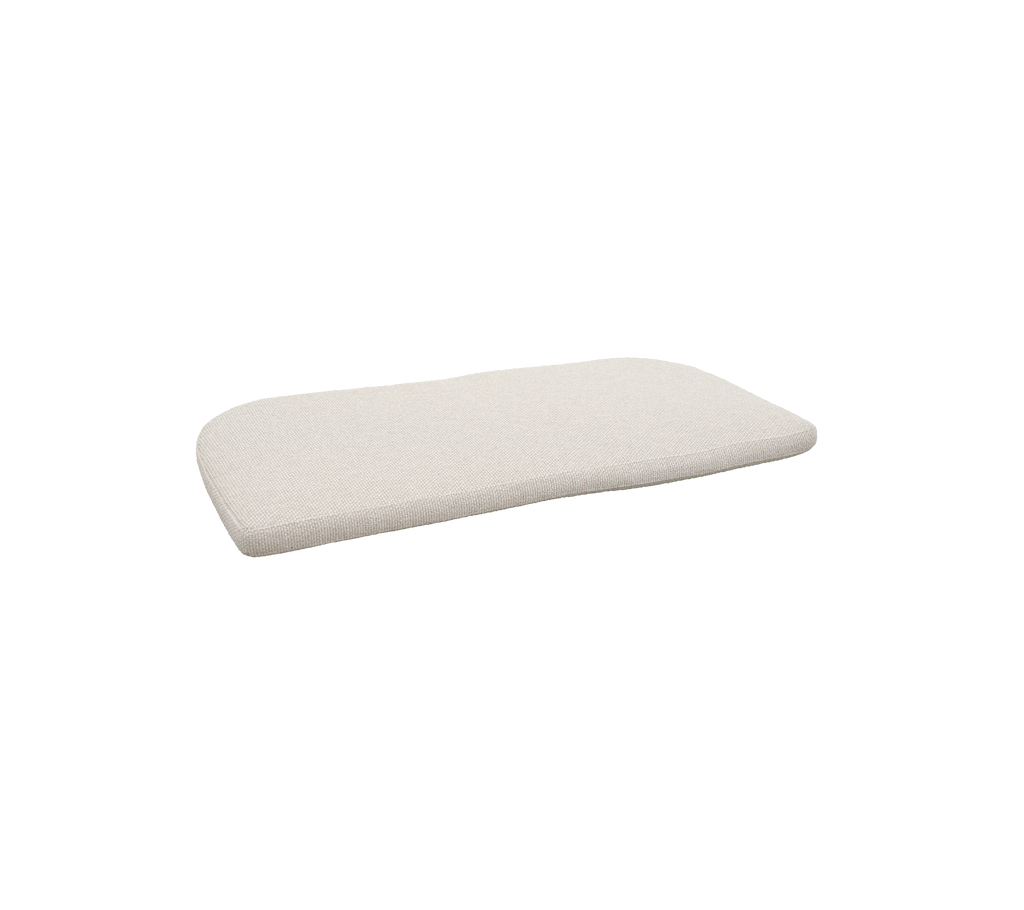 Desert sand cushion with a soft, rounded shape.