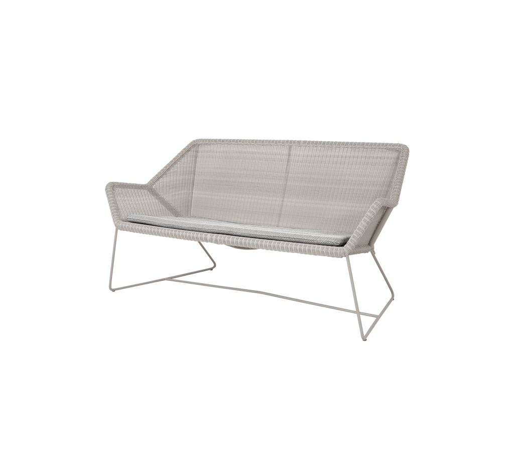 Light grey modern sofa with a sleek design.