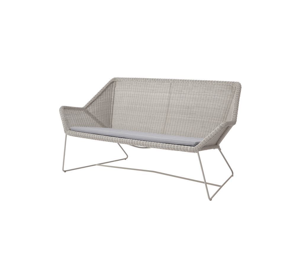 Light grey loveseat with a minimalist design and sleek frame.