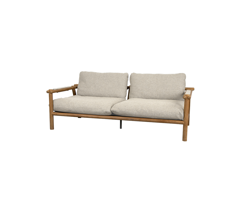 Modern teak sofa with desert sand cushions.