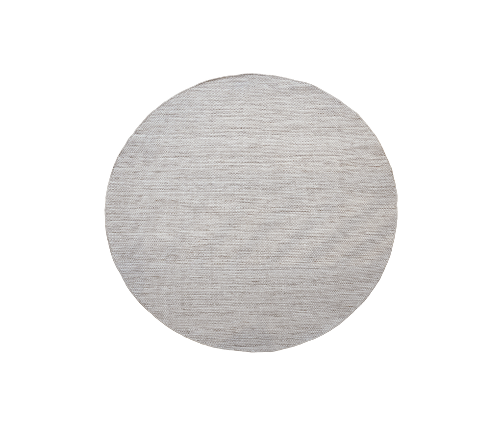 Round table in a sand multi-color finish.